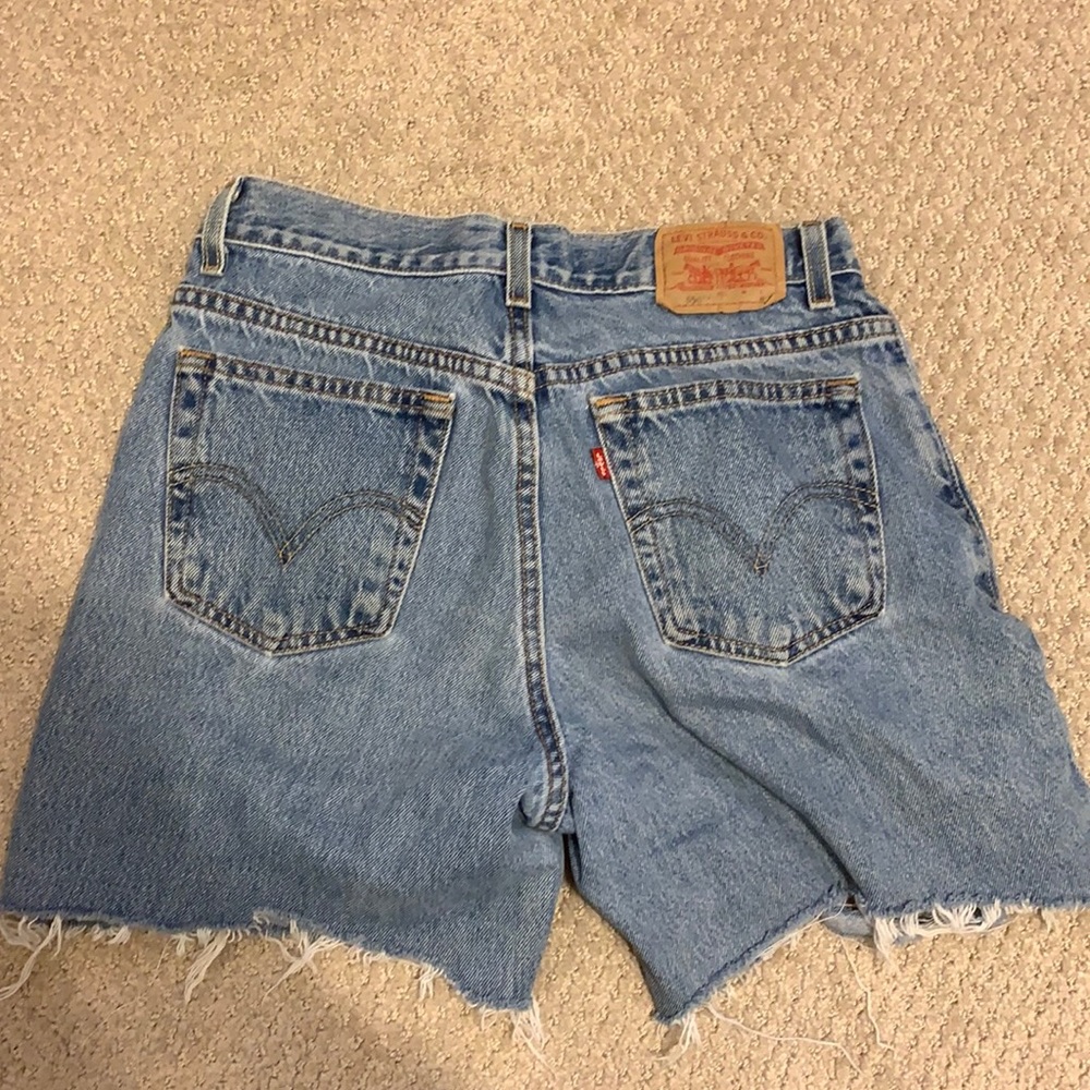 Levi’s 550 distressed denim shorts